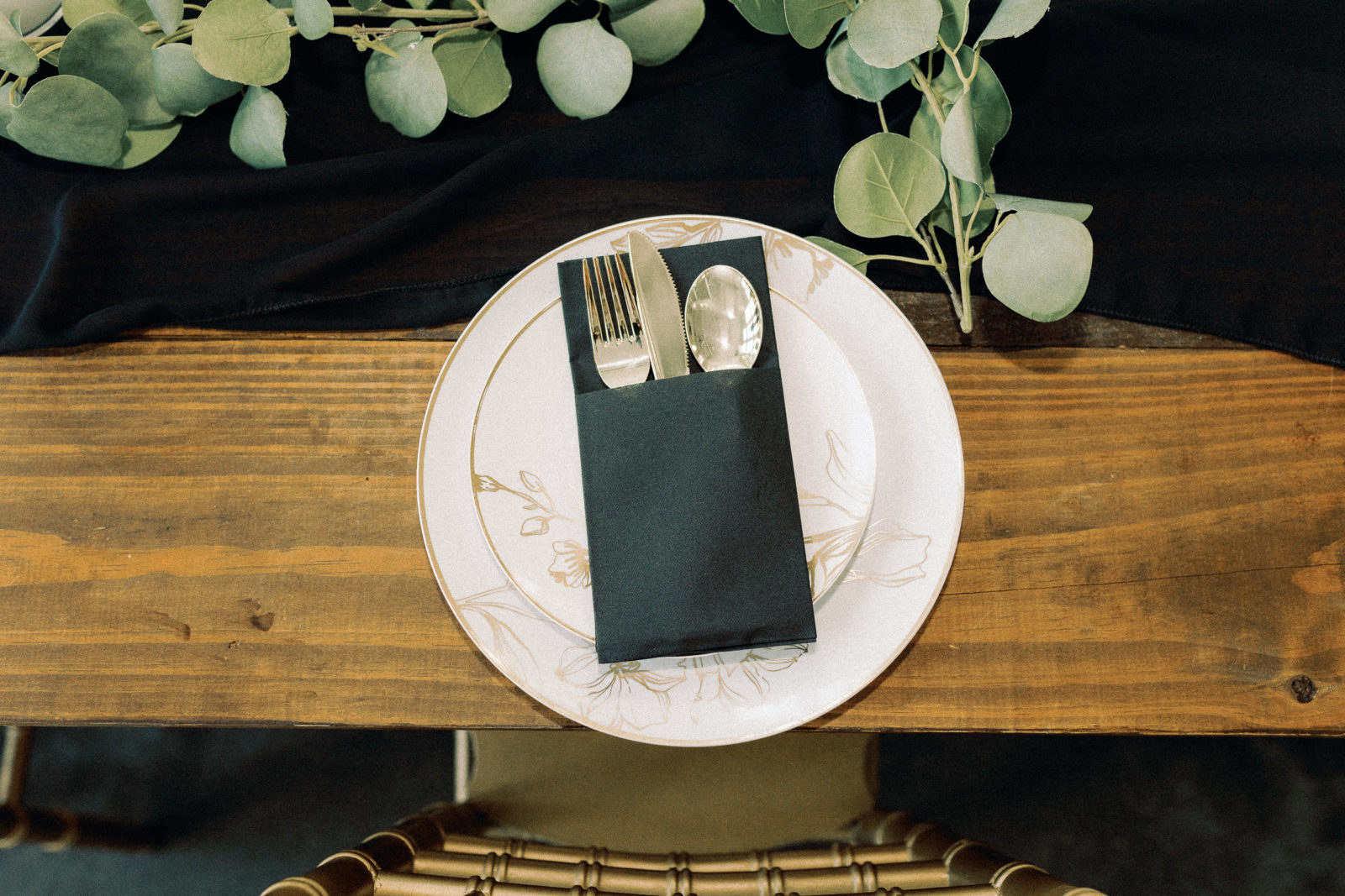 timeless black and gold table setting