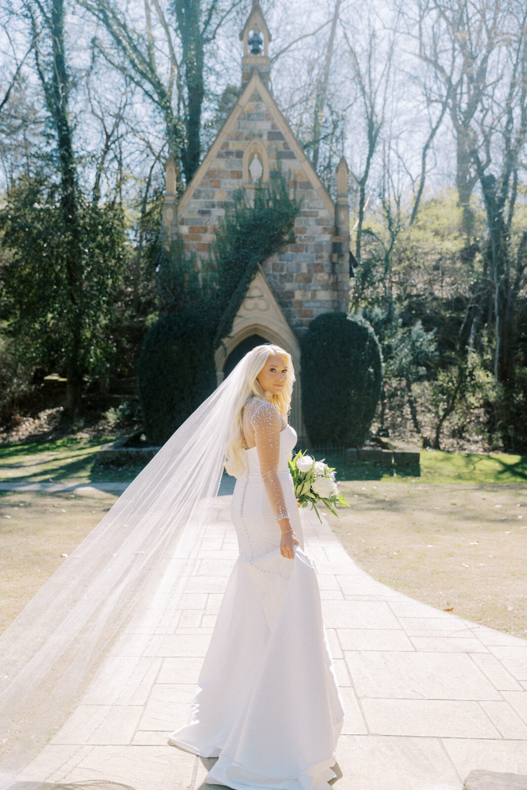 Grace wearing a diamond-accented wedding dress during her spring bridal session