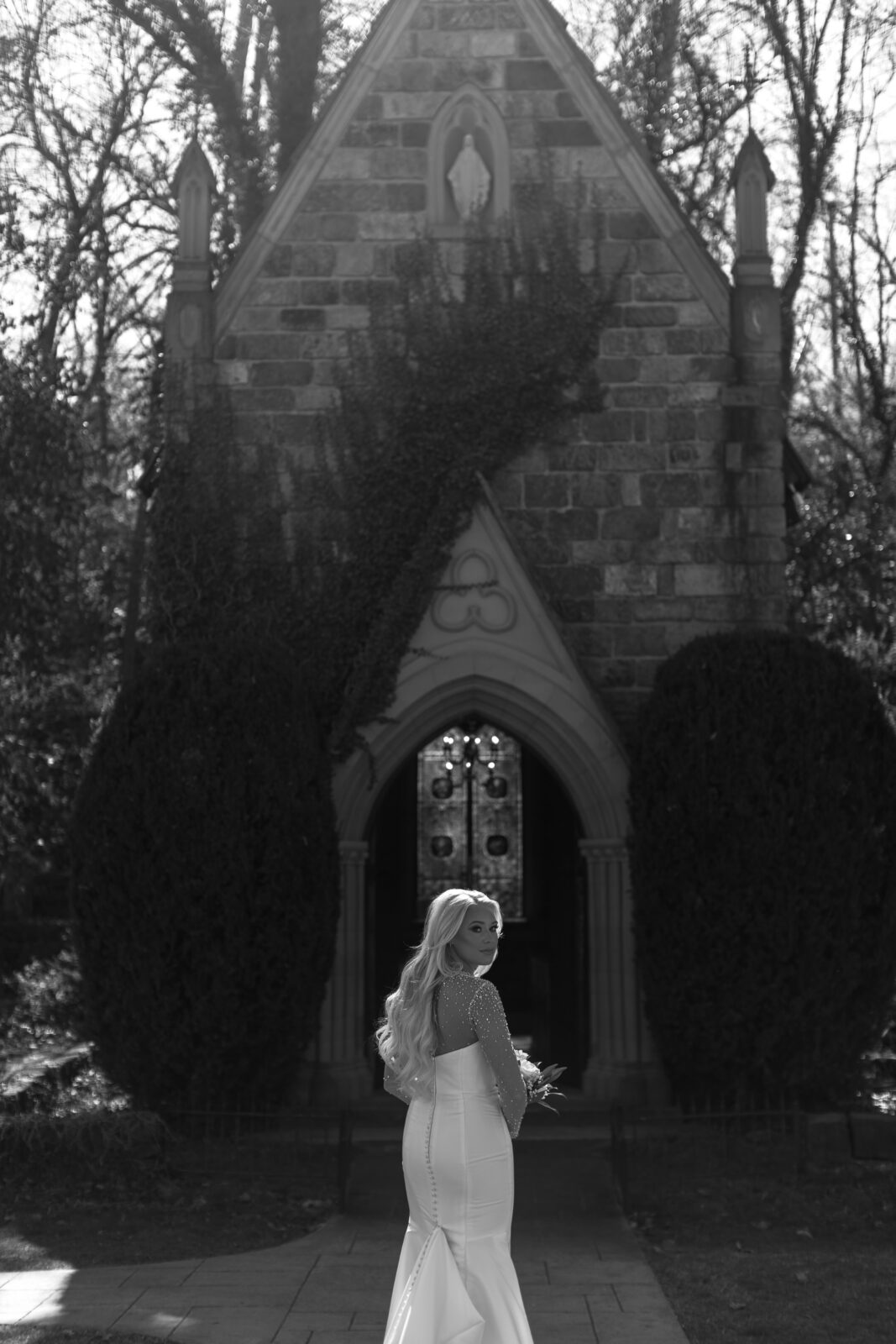 Grace wearing a diamond-accented wedding dress during her spring bridal session